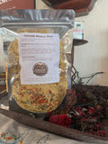 Package of dried soup mix with a label on a textured surface